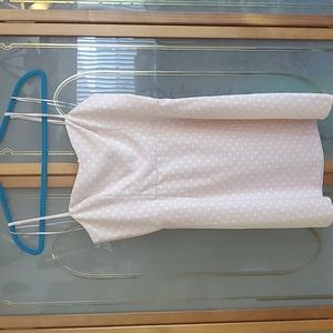 Pink polka dot form fitting summer dress.